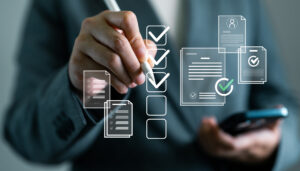 Image of a person that is doing an audit checklist